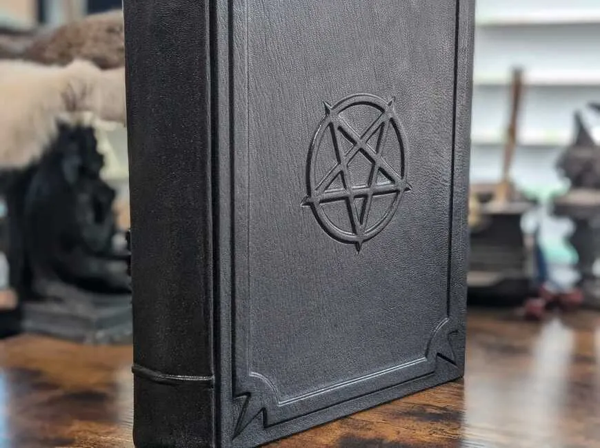 Handmade black leather spell book with pentacle
